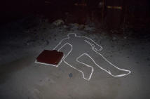 Chalk outline marking a position at a crime scene