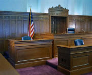 Empty courtroom where expert testimony is delivered